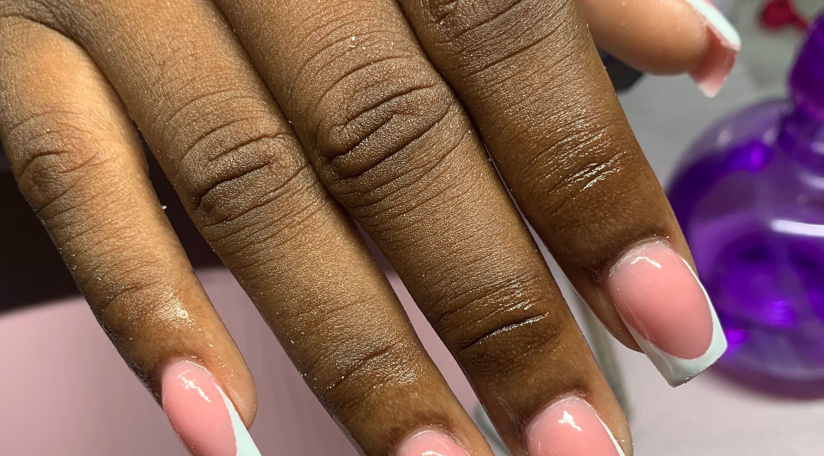 Elegant French manicure at La Luz Beauty Studio, Saint Michael, Saint Michael, BB. Pink polish with white tips.