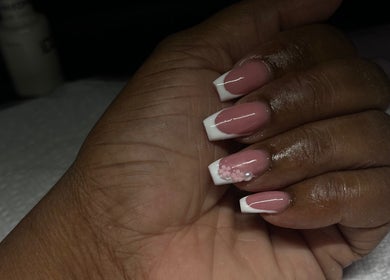 Elegant pink and white nails with flower design at La Luz Beauty Studio, Saint Michael, Saint Michael, BB.