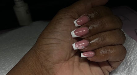 Elegant pink and white nails with flower design at La Luz Beauty Studio, Saint Michael, Saint Michael, BB.