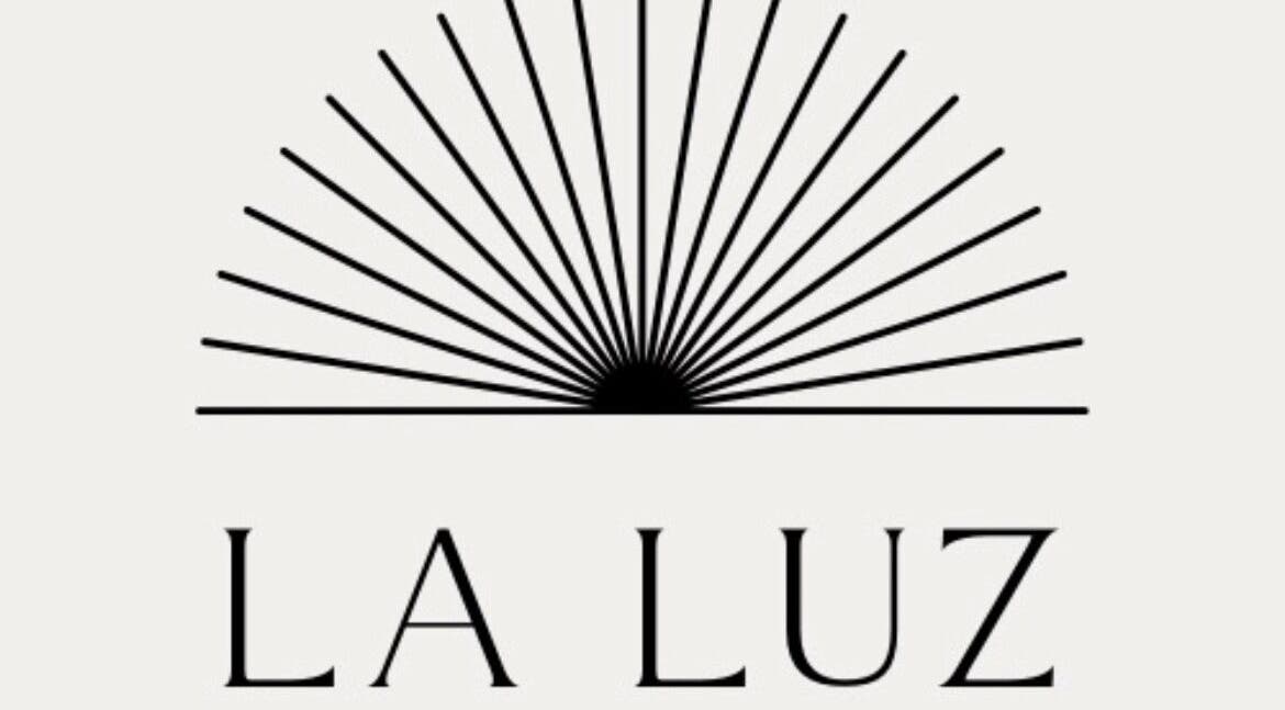 La Luz Beauty Studio logo featuring a stylized sunburst design, Saint Michael, Saint Michael, BB.