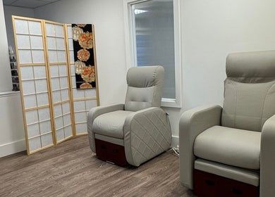 Relaxing pedicure chairs at Tokyo Nailya, London, England, GB offering calm and comfort for wellness sessions.