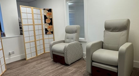Relaxing pedicure chairs at Tokyo Nailya, London, England, GB offering calm and comfort for wellness sessions.