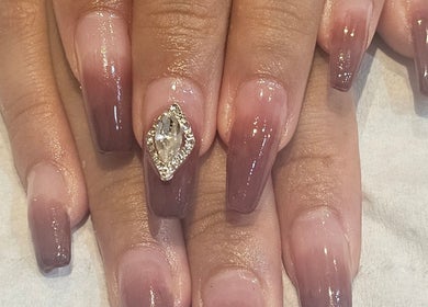 Stylish ombre nails with gem detail at Tokyo Nailya, London, England, GB.