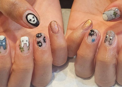 Creative nail art with cartoon designs at Tokyo Nailya, London, England, GB.