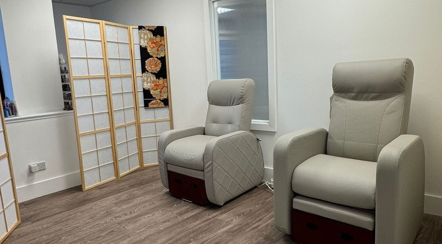 Relaxing chairs in the serene setting of Tokyo Nailya, London, England, GB.