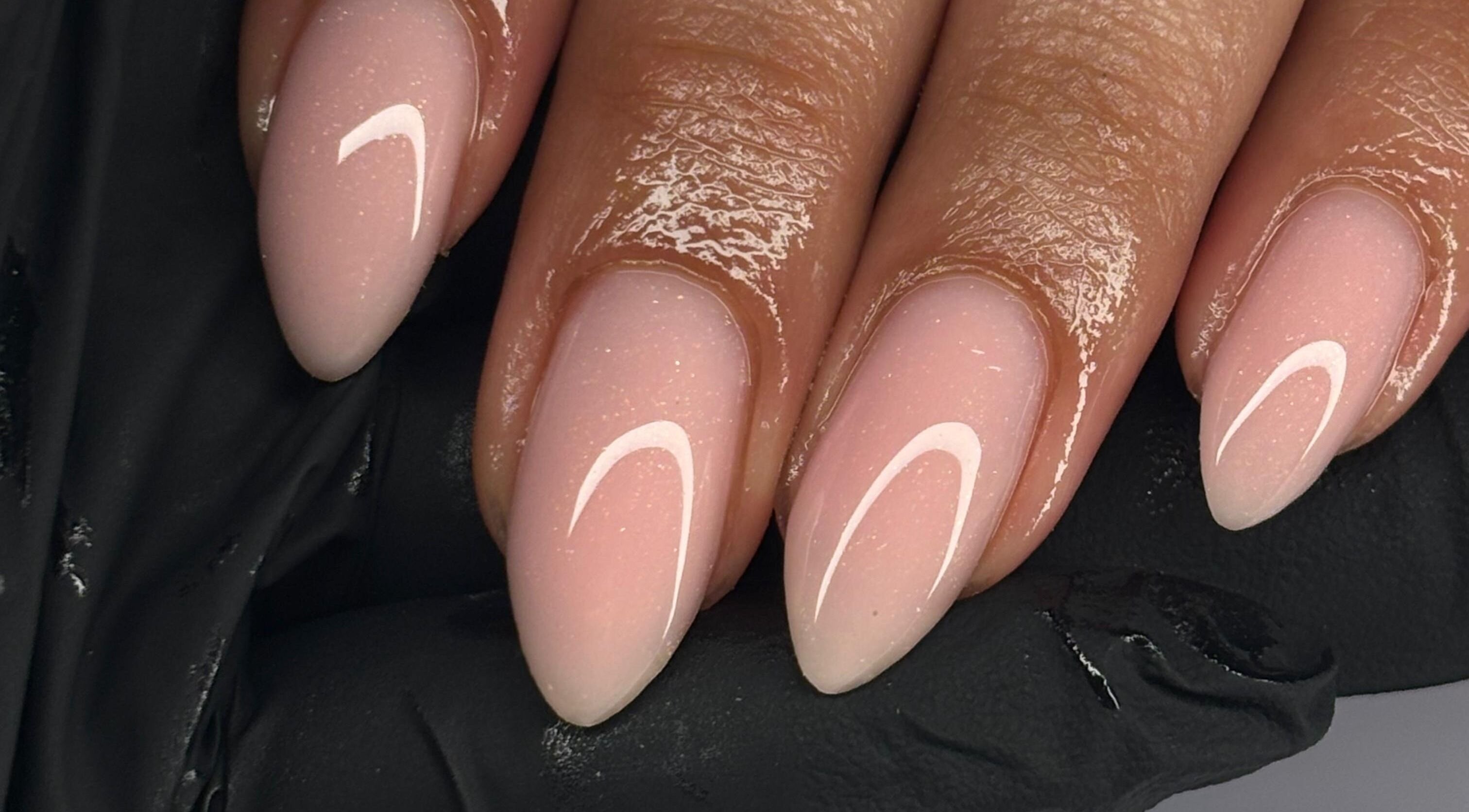 Elegant pink manicure with glossy finish at NF Artistry, Cape Town, Western Cape, ZA.
