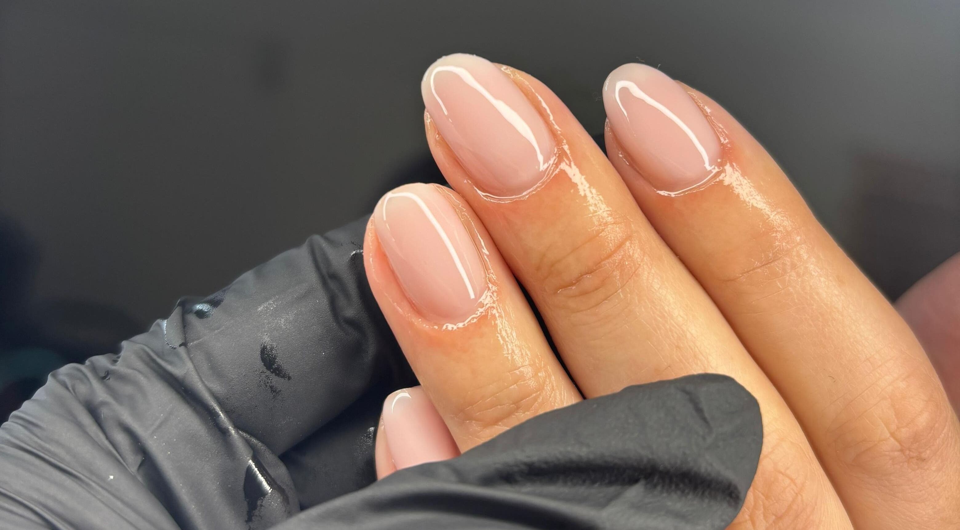 Close-up of manicured nails with glossy finish at NF Artistry, Cape Town, Western Cape, ZA.