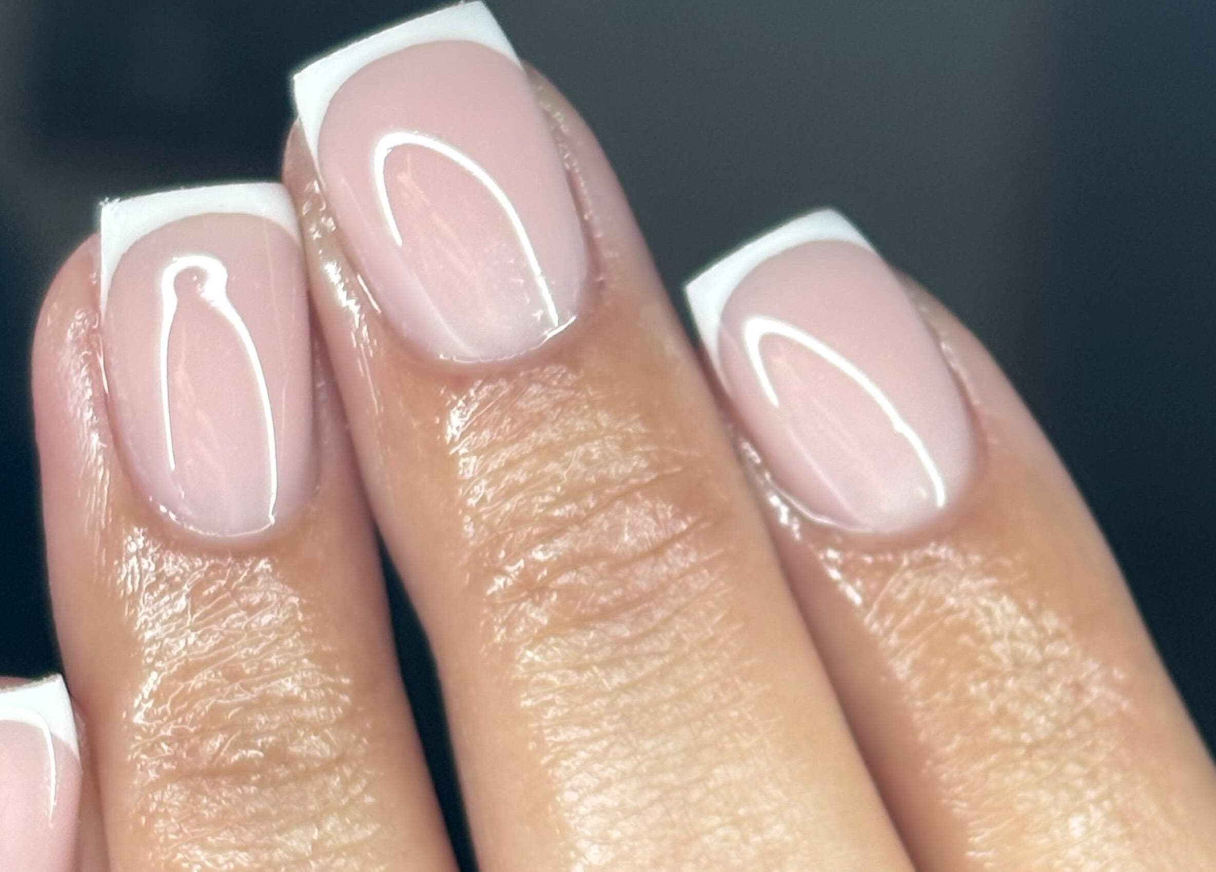 French manicure at NF Artistry in Cape Town, Western Cape, ZA showcasing pristine nail art design.