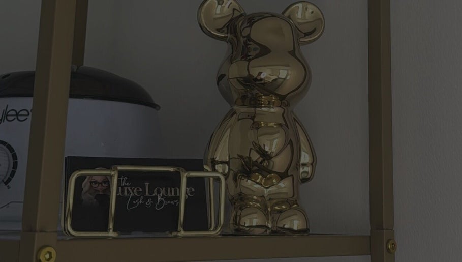 Stylish golden bear sculpture at The Luxe Lounge Lash & Brows, Cardiff, Wales, GB, enhancing decor.