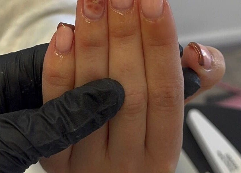 Floral nail art services at The Luxe Lounge Lash & Brows, Cardiff, Wales, GB. Detailed manicure with expert precision.