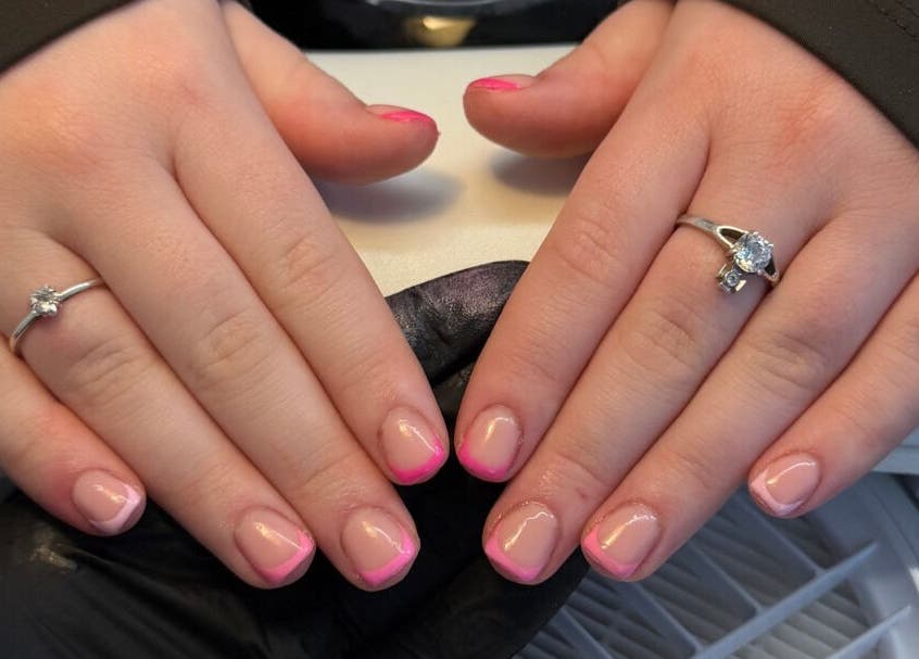 Elegant pink manicure at The Luxe Lounge Lash & Brows, Cardiff, Wales, GB, showcasing glamorous nail design.