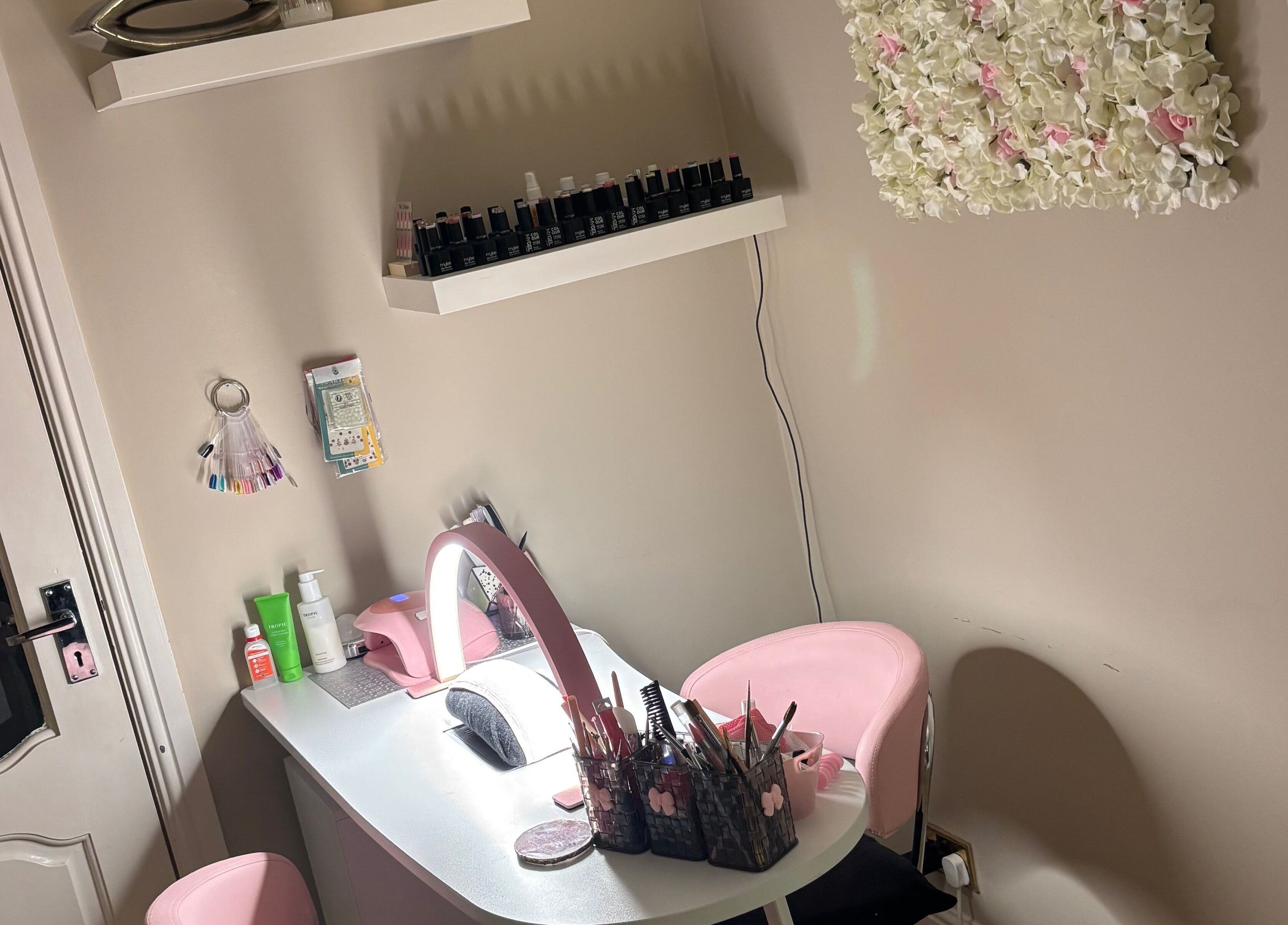 Chic nail station at Lush Beauty in Stafford, England, GB showcasing polishes and tools.