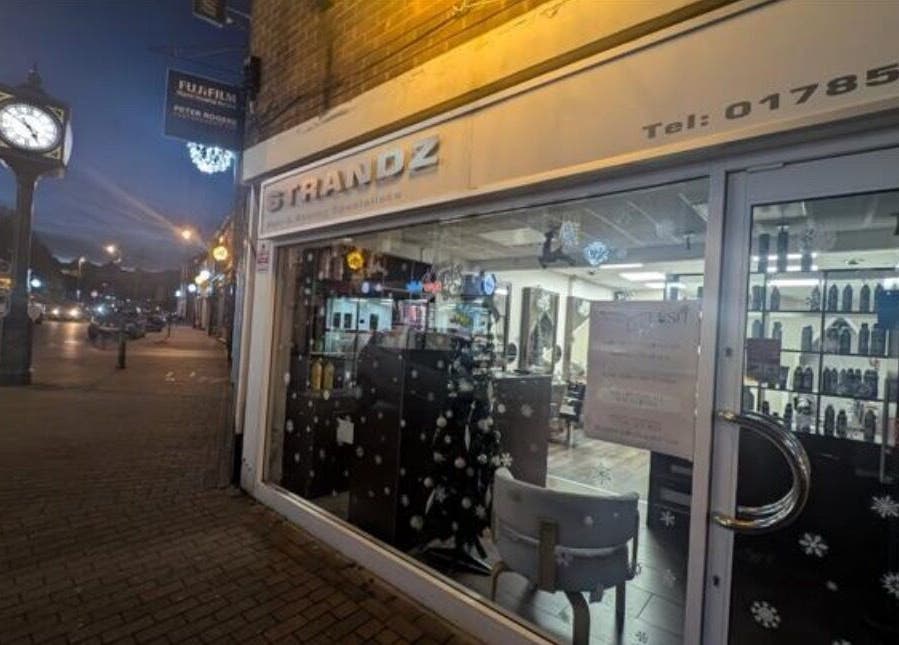Evening view of Lush Beauty salon exterior on a busy street in Stafford, England, GB.
