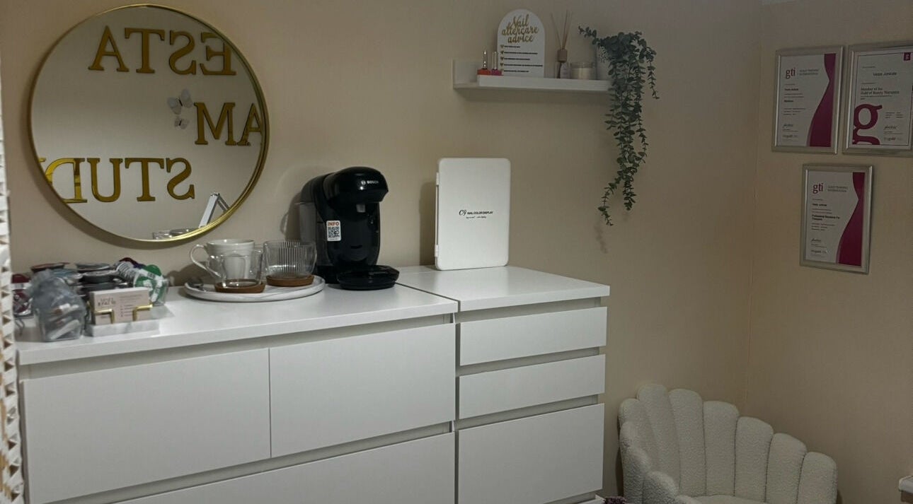 Elegant beauty station at By.vestajonkute salon, Liverpool, England, GB, featuring decor and refreshments.