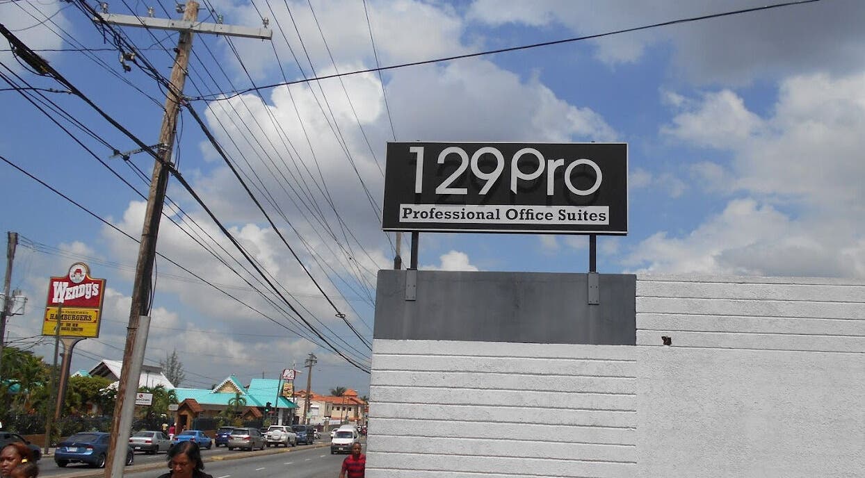 Signboard of 129PRO, home to Skin Institute of Jamaica, at 129 Hope Road, Kingston, St. Andrew Parish, JM.
