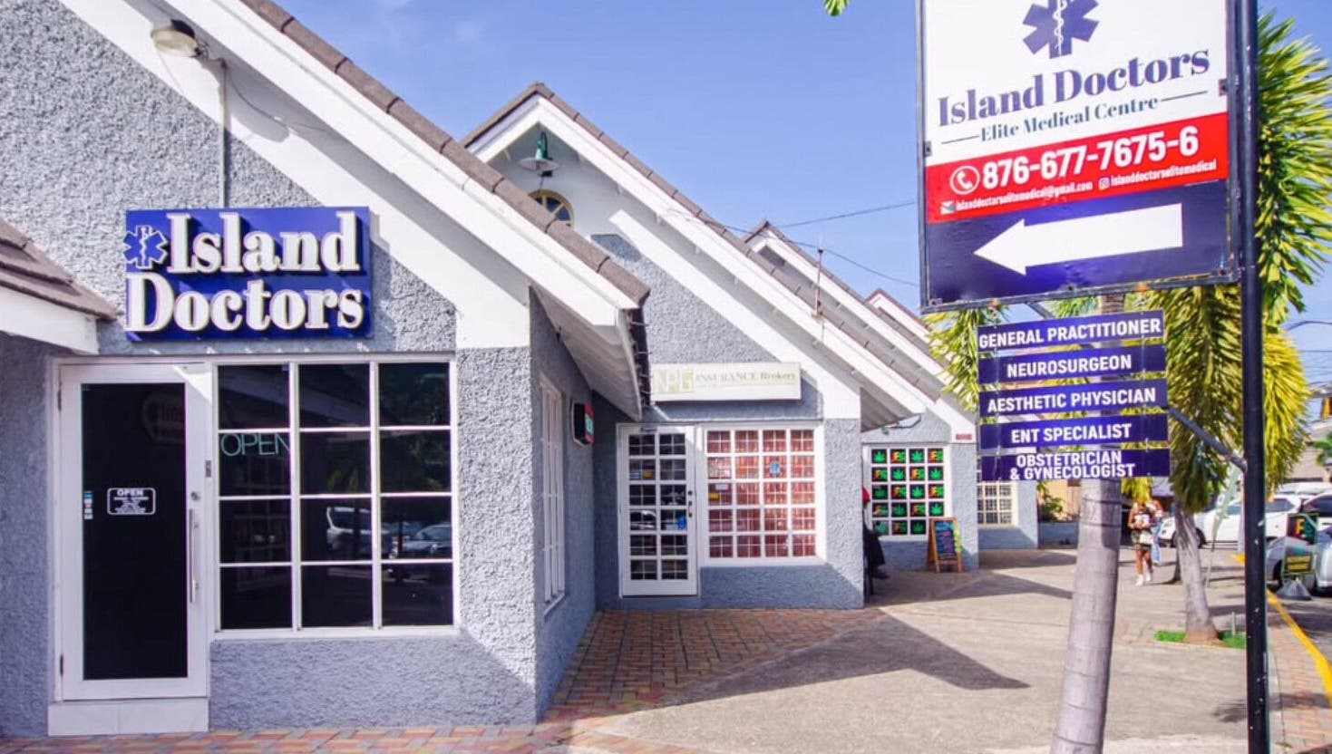 Front of Island Doctors Elite Medical Centre, Ocho Rios, St. Ann Parish, JM on a sunny day.