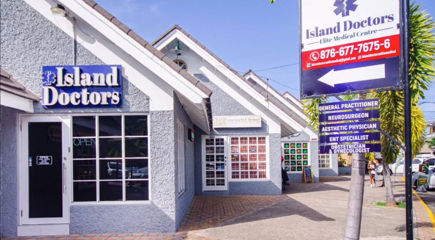 Front of Island Doctors Elite Medical Centre, Ocho Rios, St. Ann Parish, JM on a sunny day.