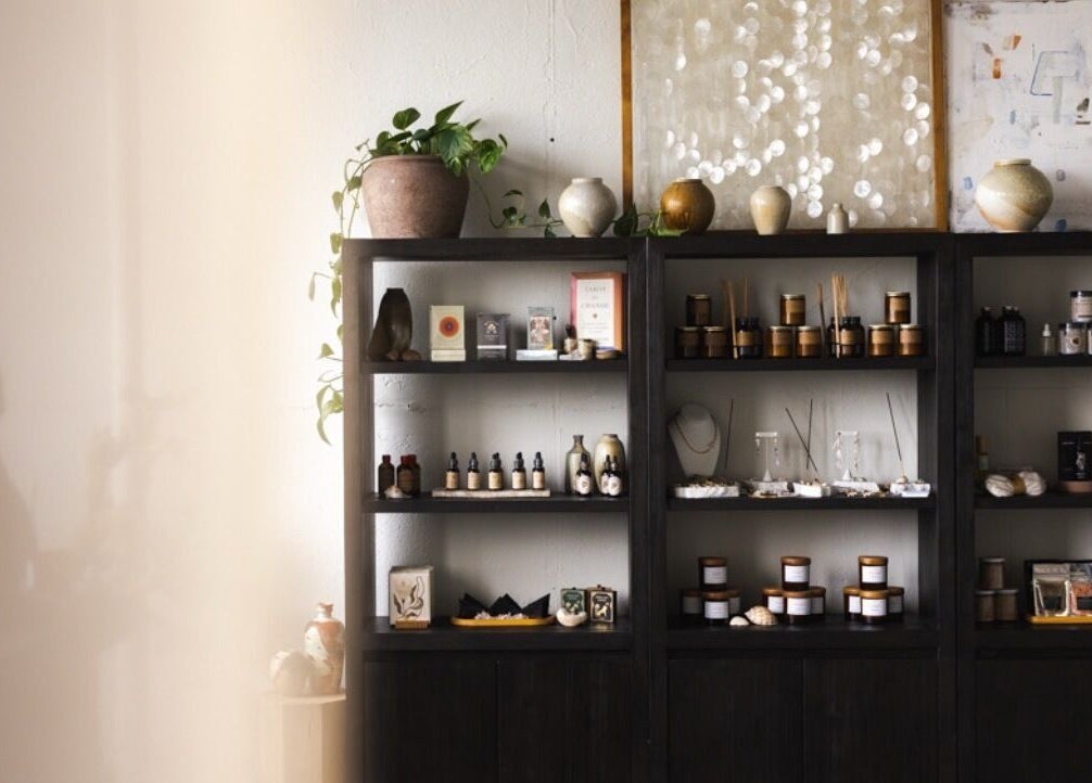 Elegant wellness shelves at LGHTTouch in Philadelphia, Pennsylvania, US, displaying natural beauty products.