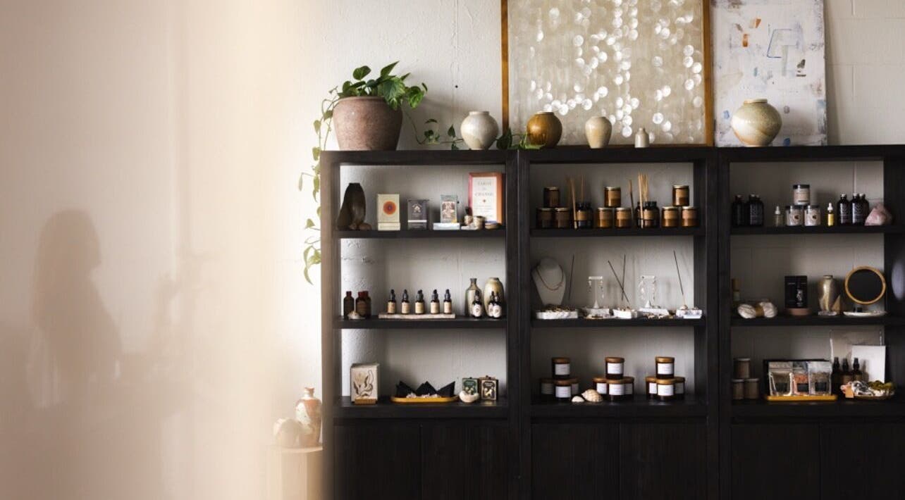 Elegant wellness shelves at LGHTTouch in Philadelphia, Pennsylvania, US, displaying natural beauty products.