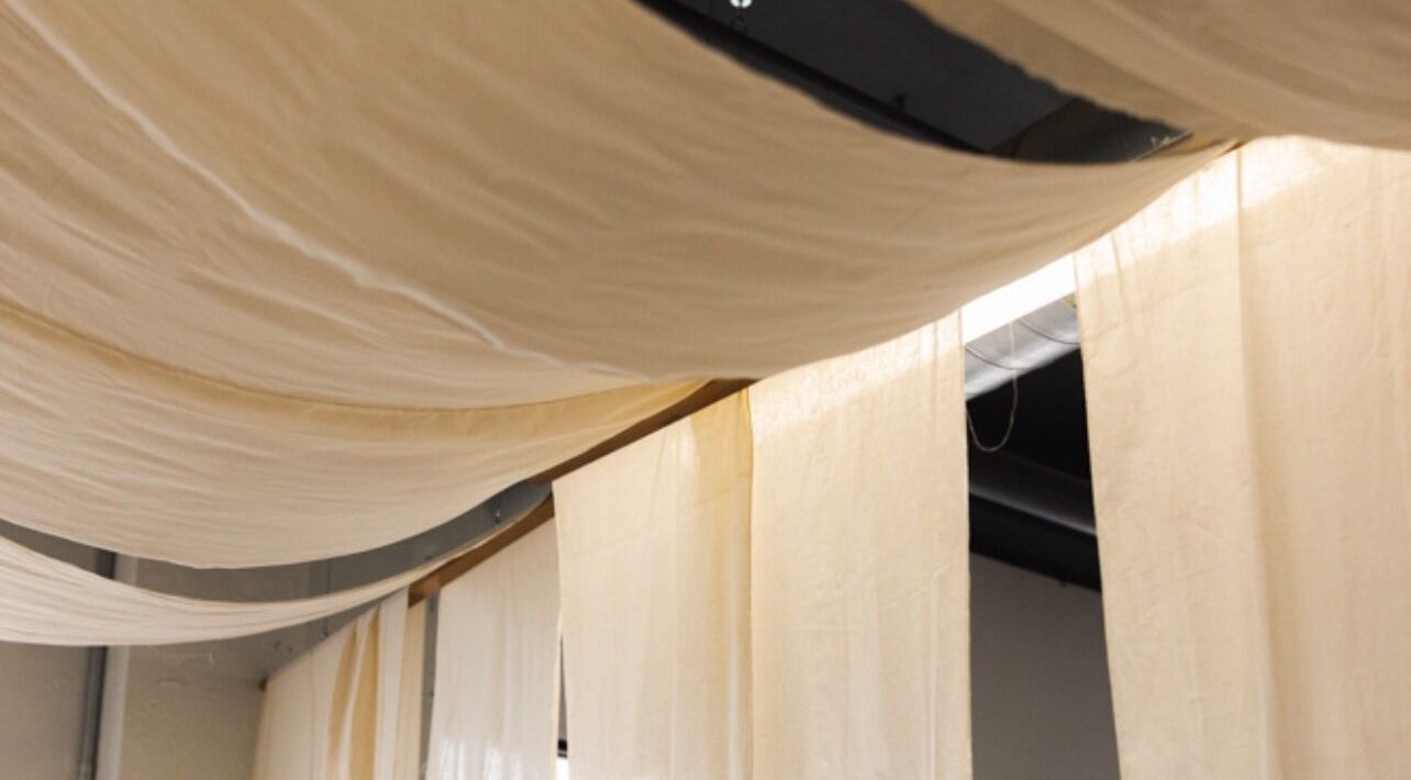 Elegant drapes create a serene ambiance at LGHTTouch in Philadelphia, Pennsylvania, US.