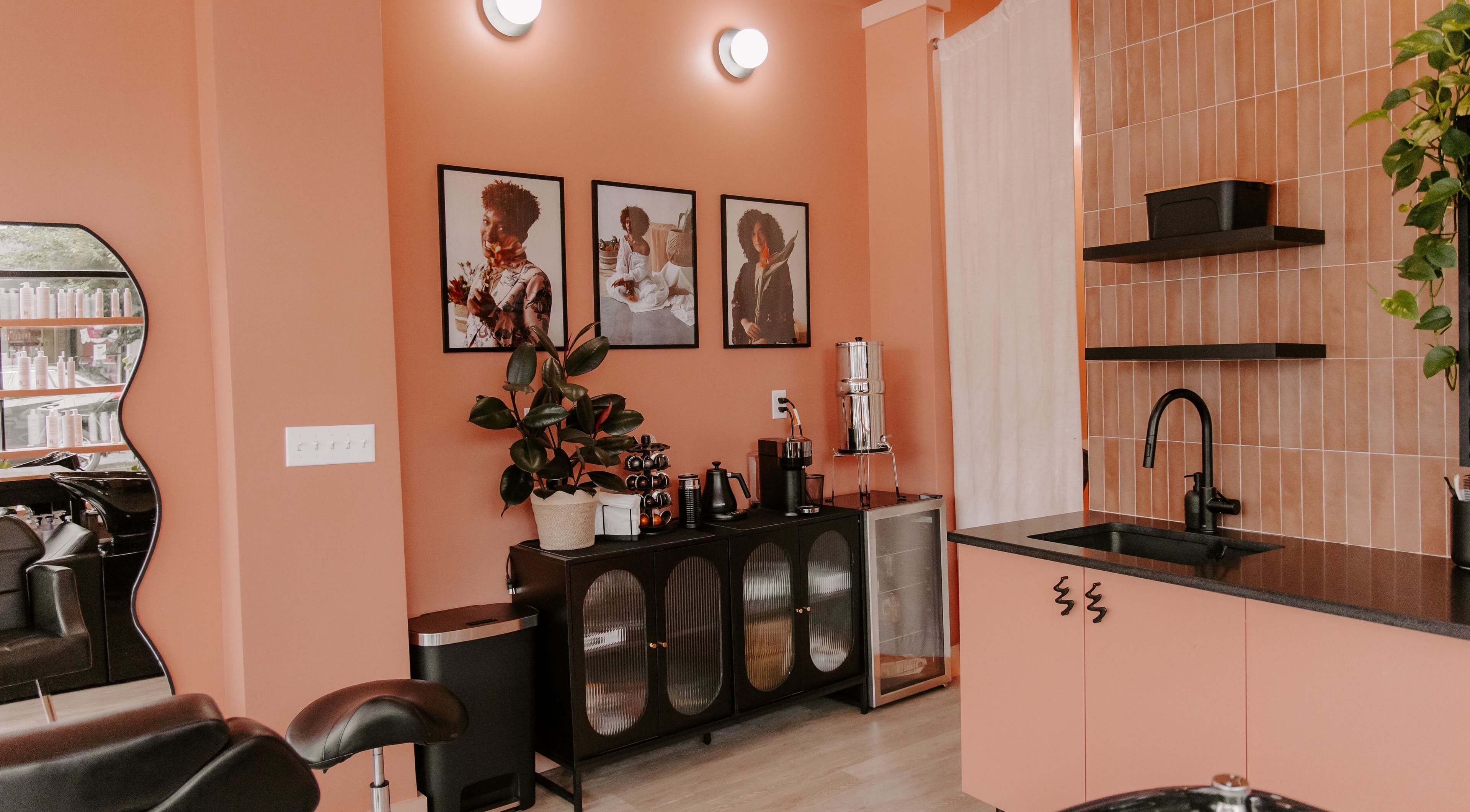 LGHTTouch Pop-Up at Wash~Day in Philadelphia, Pennsylvania, US showing stylish salon interior with decor.