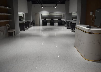 Lux Cuts N Colours salon in Bayswater, Victoria, AU. Modern, elegant interior with sleek styling stations.