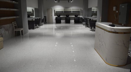 Lux Cuts N Colours salon in Bayswater, Victoria, AU. Modern, elegant interior with sleek styling stations.