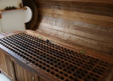 Wooden steam therapy box at Alora Skin Clinic in Colombo, Western Province, LK, offering relaxation and wellness.