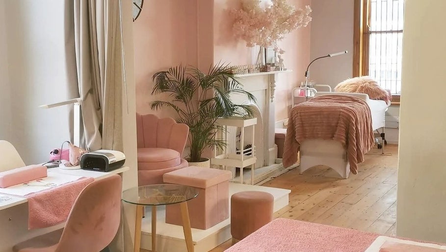 Luxurious interior of Blessing & Natasha Nails, Cape Town, Western Cape, ZA with chic decor and cozy seating.