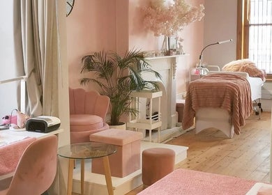 Luxurious interior of Blessing & Natasha Nails, Cape Town, Western Cape, ZA with chic decor and cozy seating.