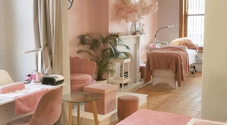 Luxurious interior of Blessing & Natasha Nails, Cape Town, Western Cape, ZA with chic decor and cozy seating.