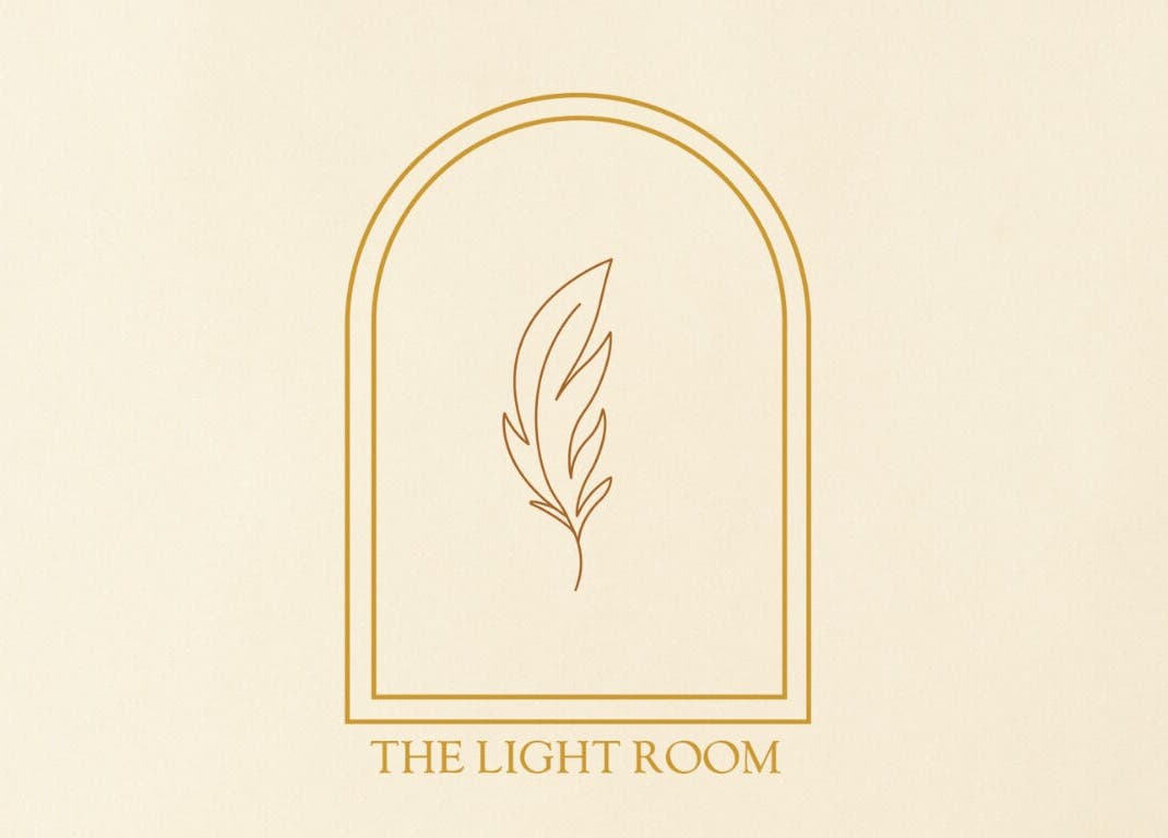 The Light Room minimalist logo with feather design, located in GB.