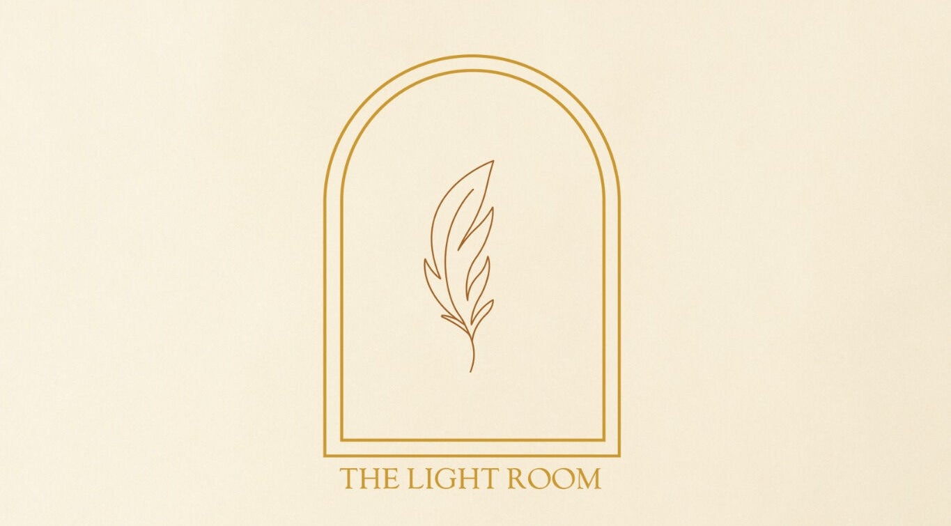 The Light Room minimalist logo with feather design, located in GB.