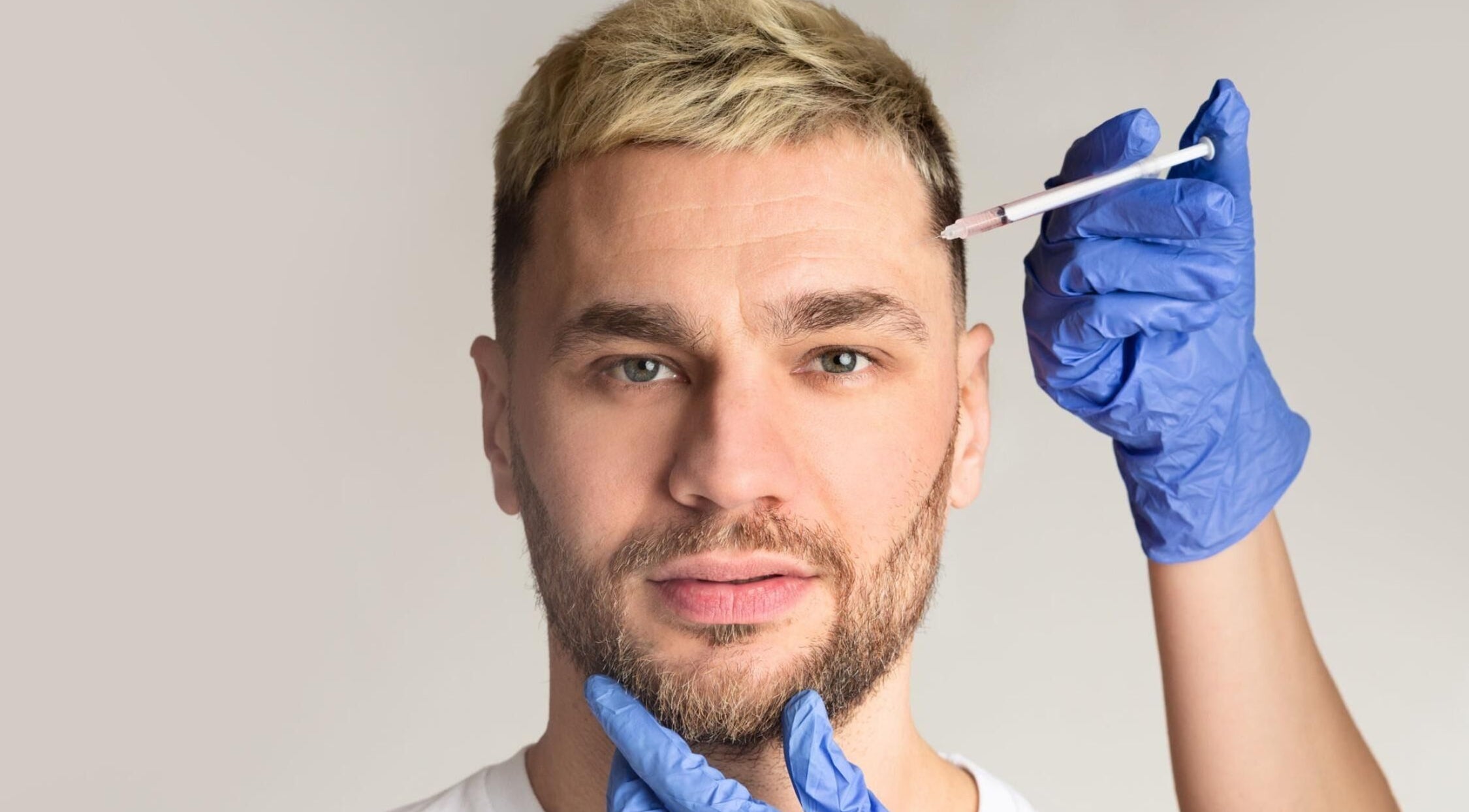 Expert care at Rejuvenated by KIROV in London, England, GB showcasing precise cosmetic treatment.