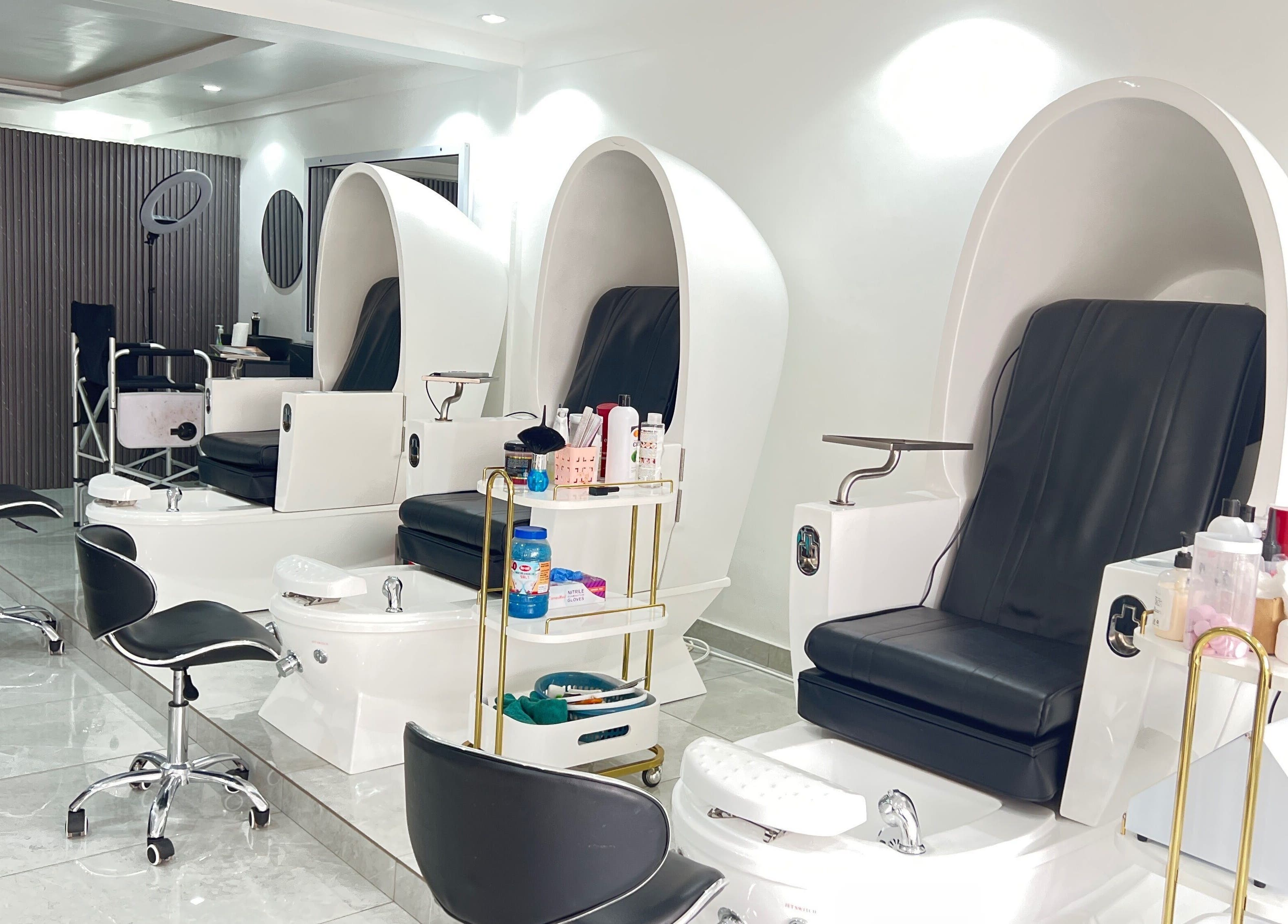 Pedicure chairs at Pharchay’s Braids and Spa, Accra, creating a luxurious and serene atmosphere.