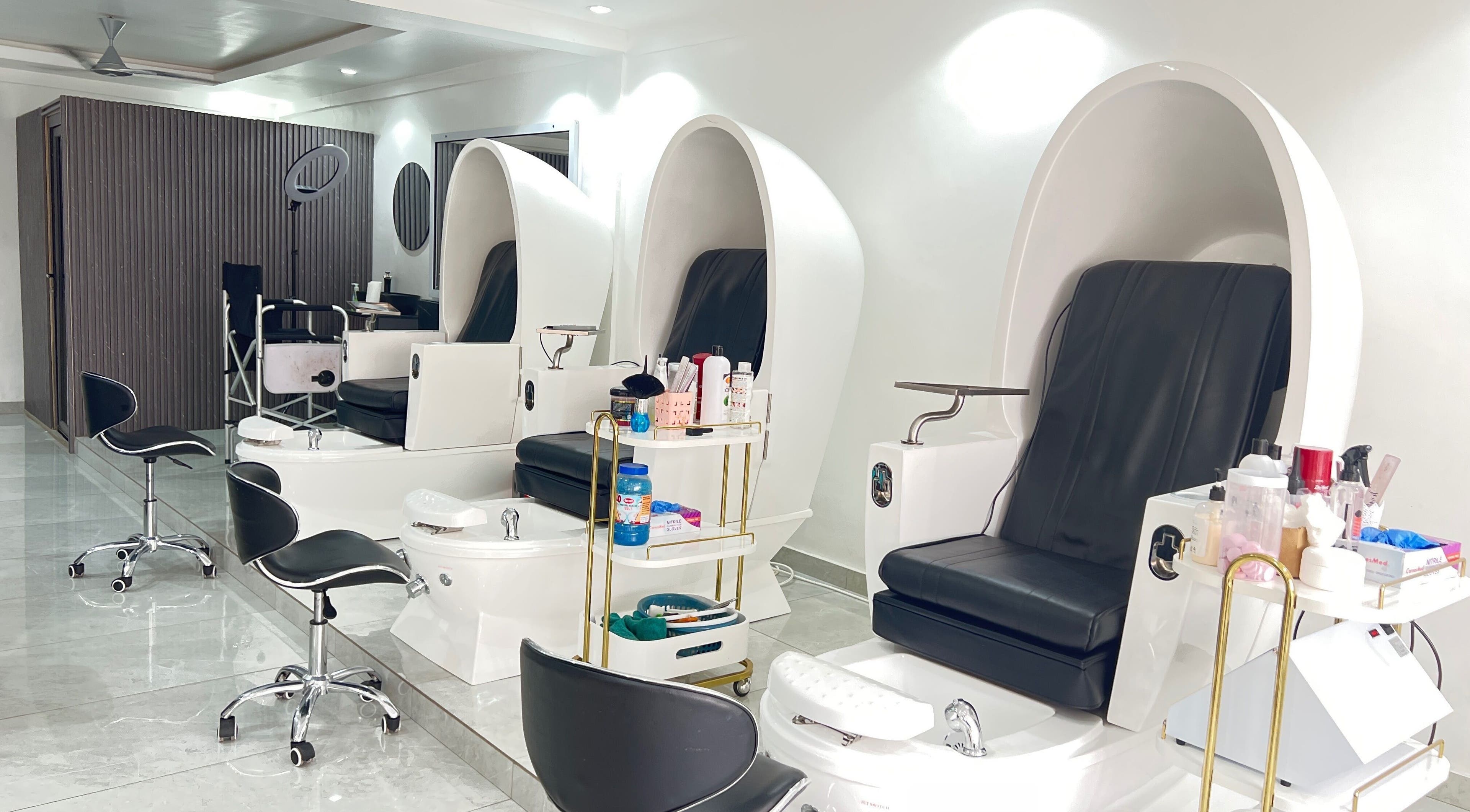 Pedicure chairs at Pharchay’s Braids and Spa, Accra, creating a luxurious and serene atmosphere.