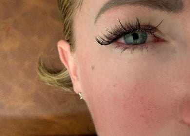 Close-up of a client's eye showcasing elegant lashes after a treatment at June Lashes - St Albans, Saint Albans, Victoria, AU.