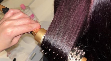 Expert hair styling at Sophie's Hair Lounge in Ellesmere Port, England, GB, showcasing precision and shine.