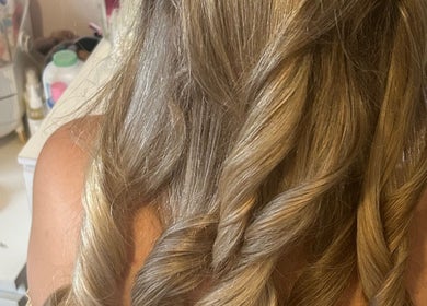 Elegant blonde curls styled at Sophie’s Hair Lounge, Ellesmere Port, England, GB.