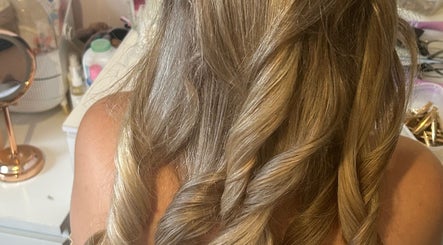 Elegant blonde curls styled at Sophie’s Hair Lounge, Ellesmere Port, England, GB.