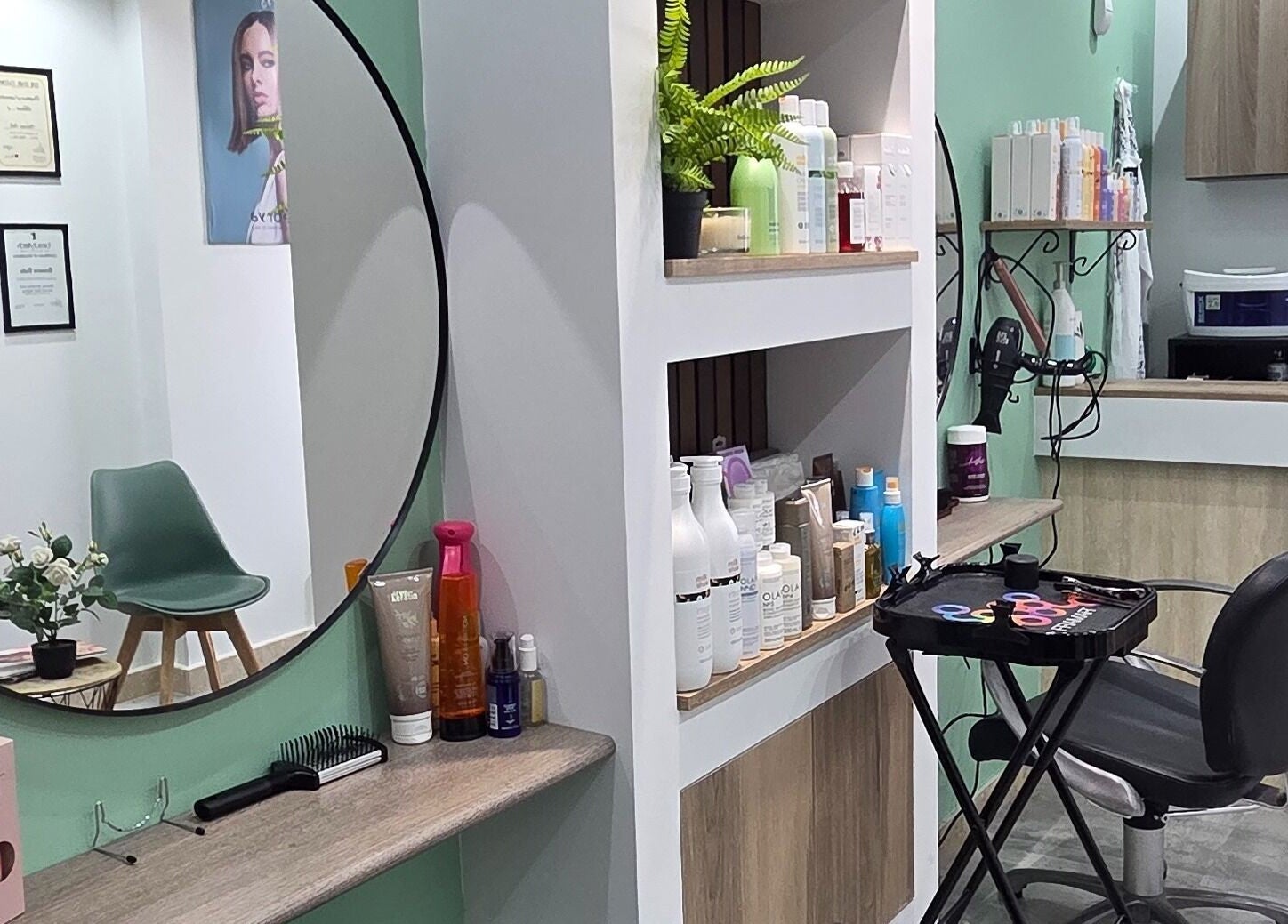 VV Hair Studio in Ħ'attard, MT features chic decor with stylish products and comfortable seating.