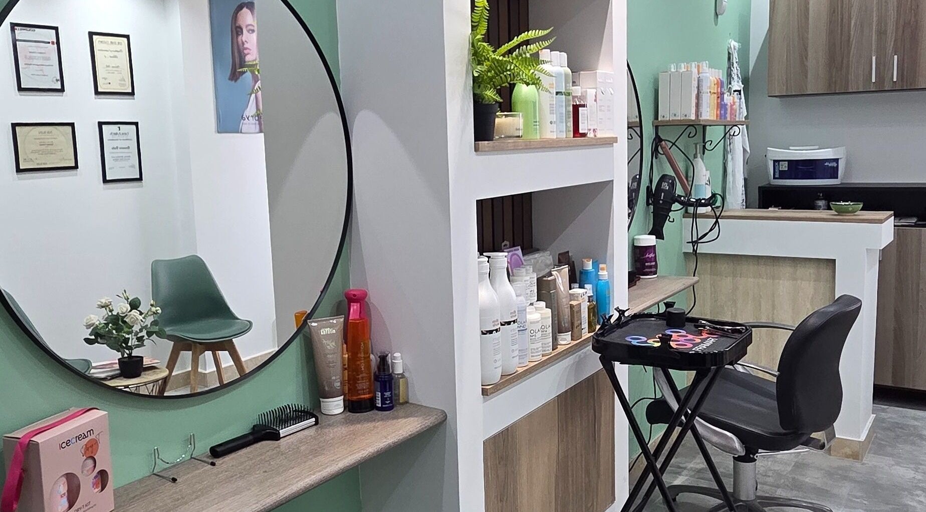 VV Hair Studio in Ħ'attard, MT features chic decor with stylish products and comfortable seating.