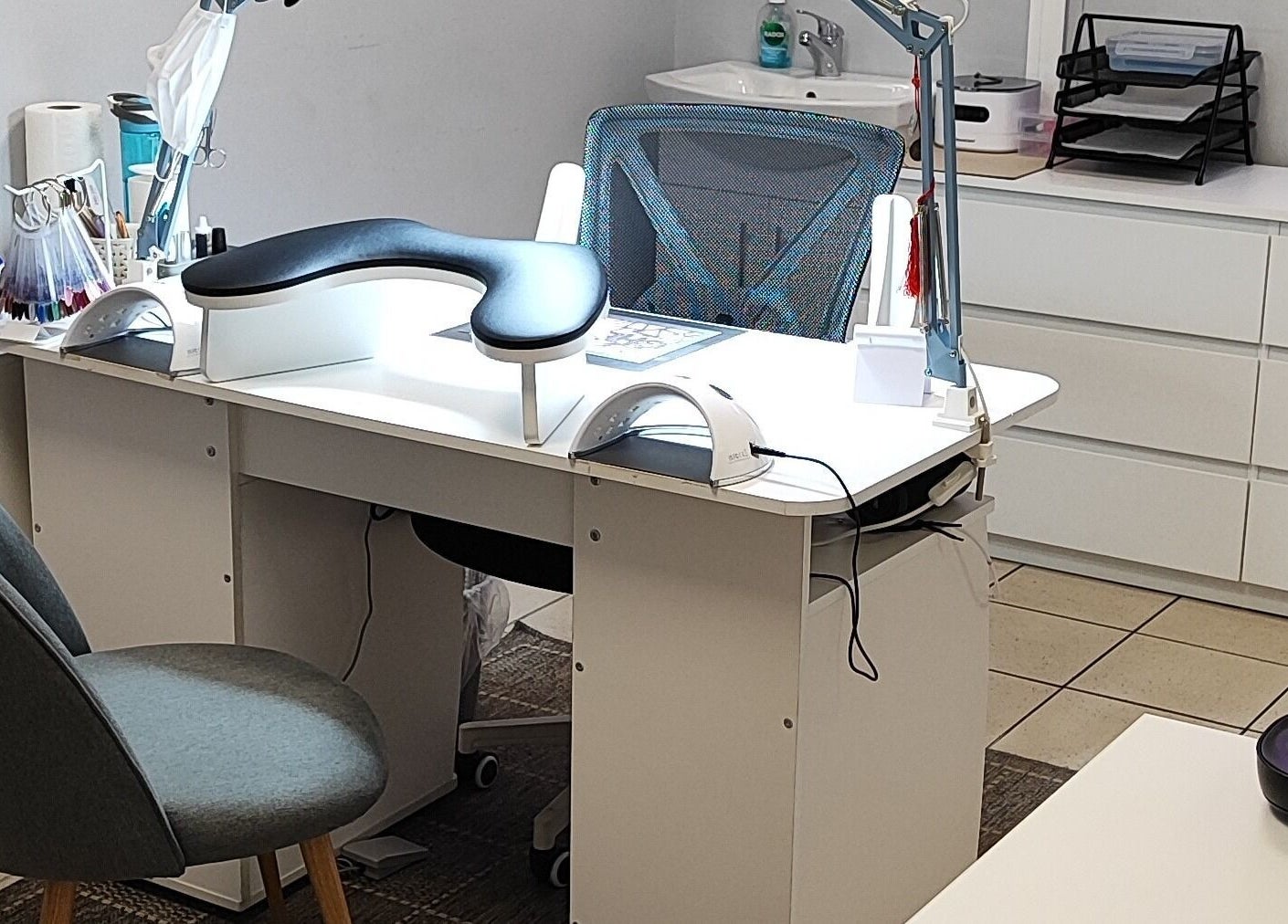 Modern nail station at Ieva's Nail Studio, Claregalway, IE, showcasing a stylish setup for manicures.