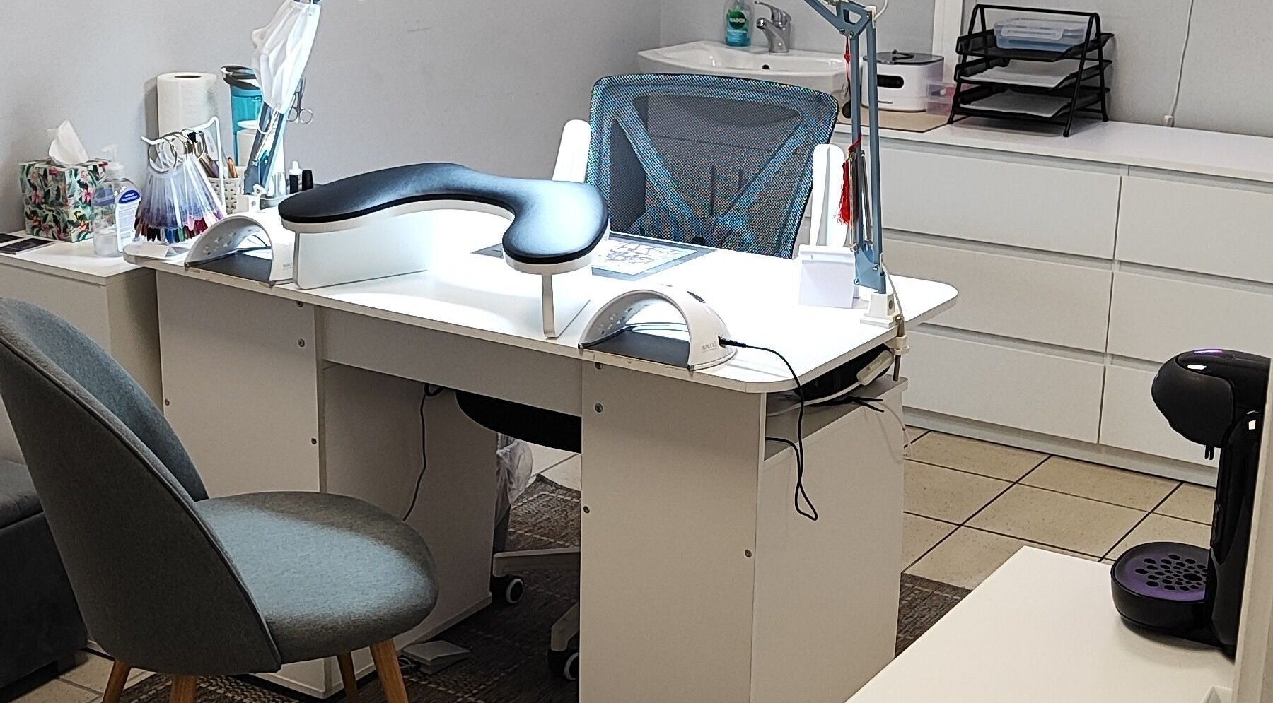 Modern nail station at Ieva's Nail Studio, Claregalway, IE, showcasing a stylish setup for manicures.