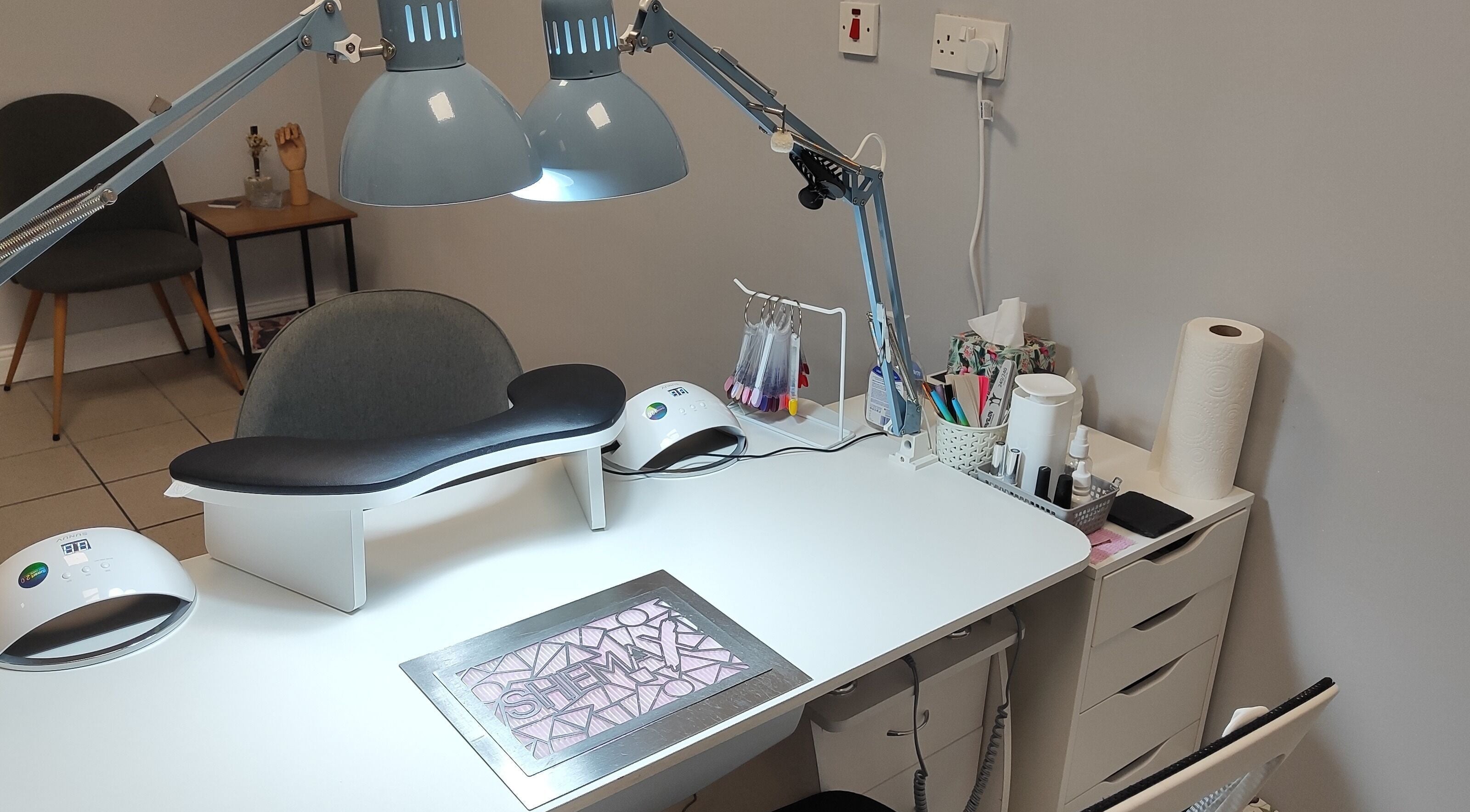 Modern nail station at Ieva's Nail Studio in Claregalway, IE, featuring a well-equipped workspace.