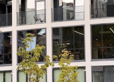 Exterior of The Dapper Fox Barber in Tiranë, Tirana County, AL showcasing its modern facade.