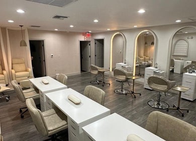 Chic salon chairs and mirrors in Linduk by Lizzy, Cape Coral, Florida, US, showcasing modern elegance.