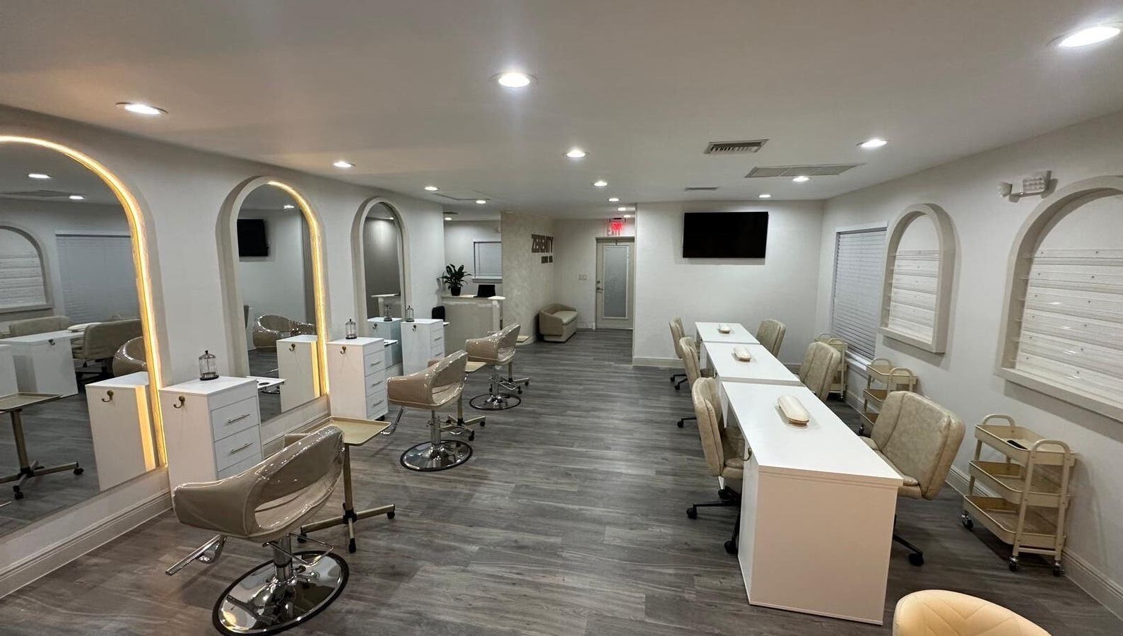 Modern salon interior at Lizzy, Cape Coral, Florida, US, featuring elegant chairs and stylish decor.