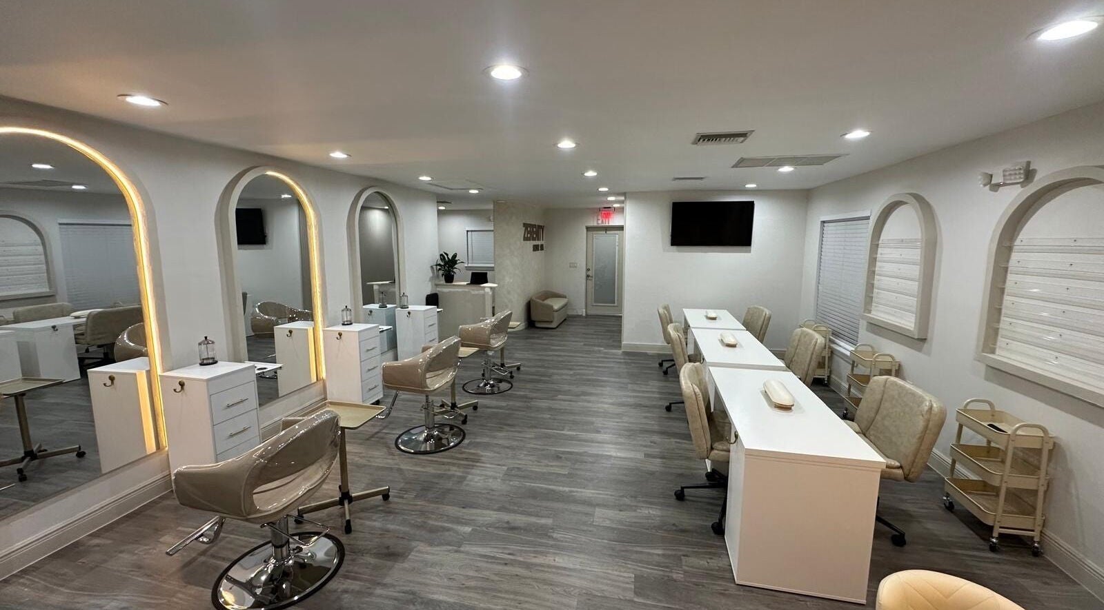 Modern salon interior at Lizzy, Cape Coral, Florida, US, featuring elegant chairs and stylish decor.