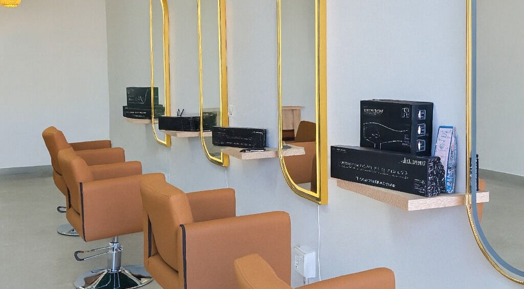 Sleek salon chairs and golden mirrors at Luxe Hair Salon & Extensions Supplier, Cape Town, Western Cape, ZA.
